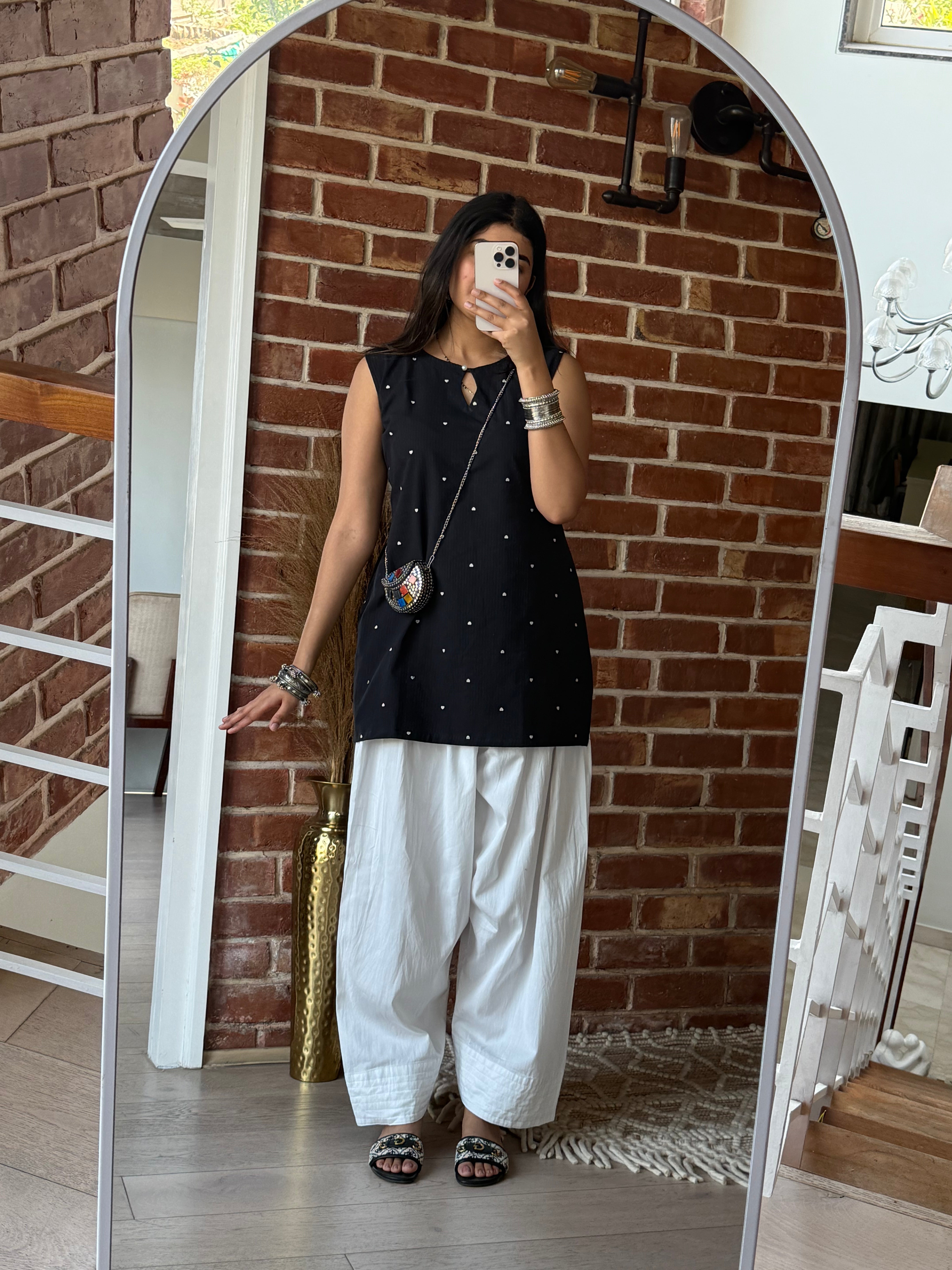 Black main character kurti