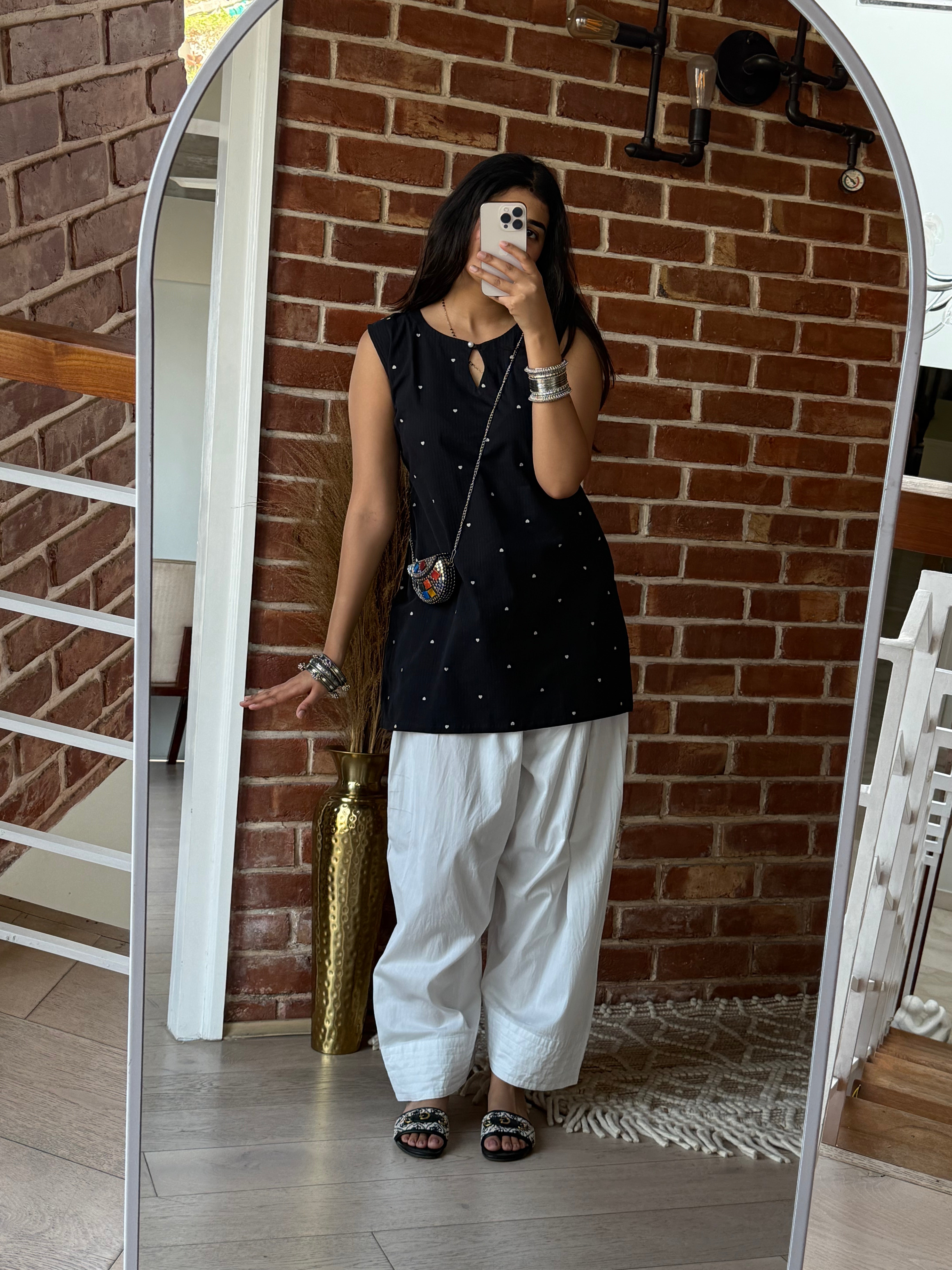 Black main character kurti