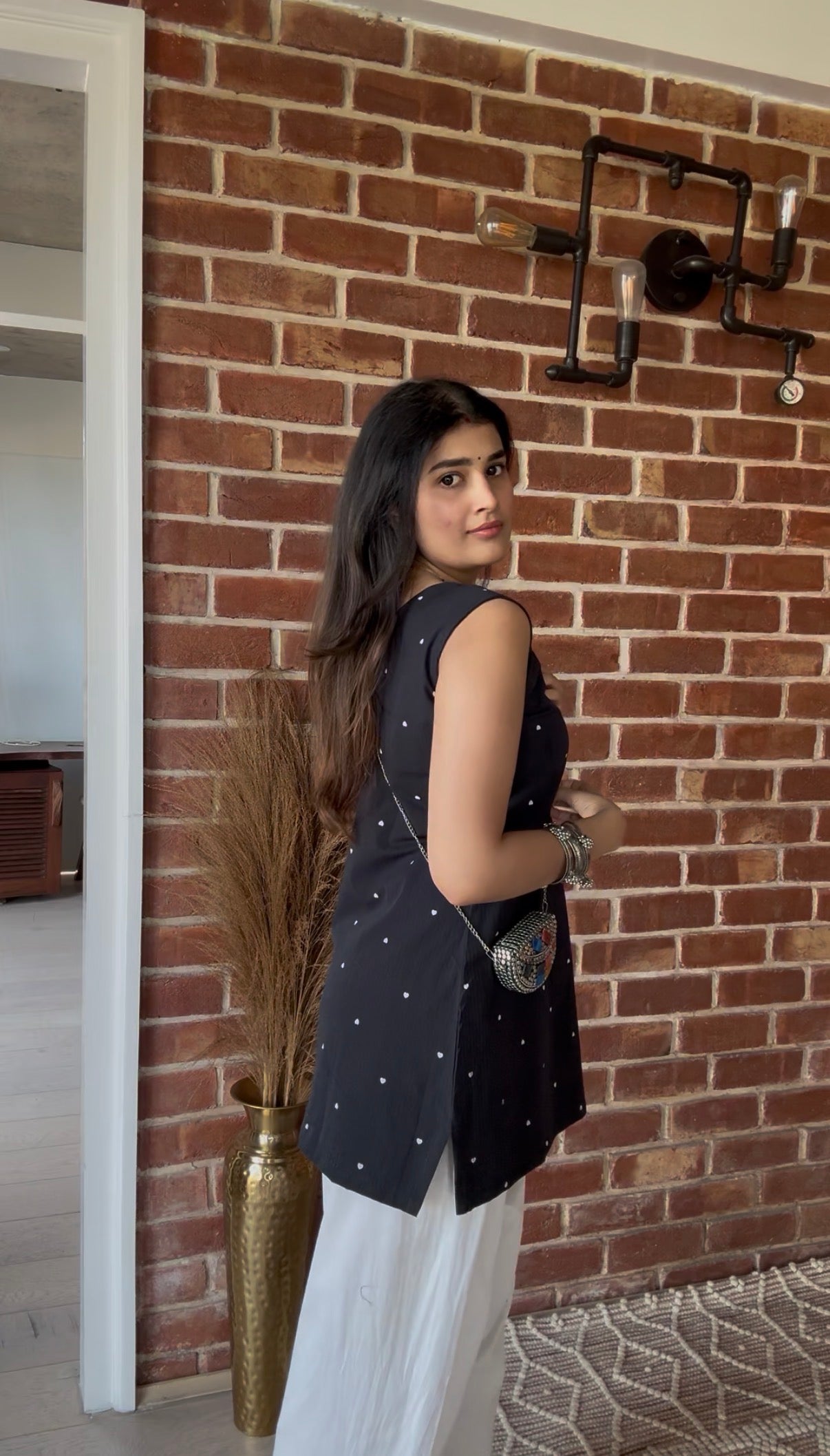 Black main character kurti