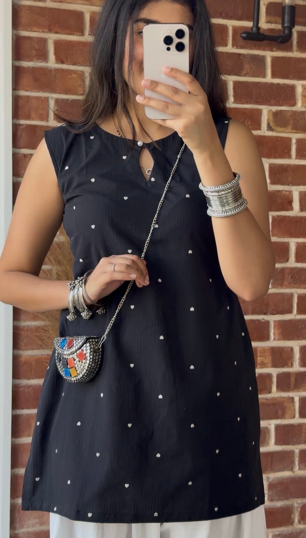 Black main character kurti