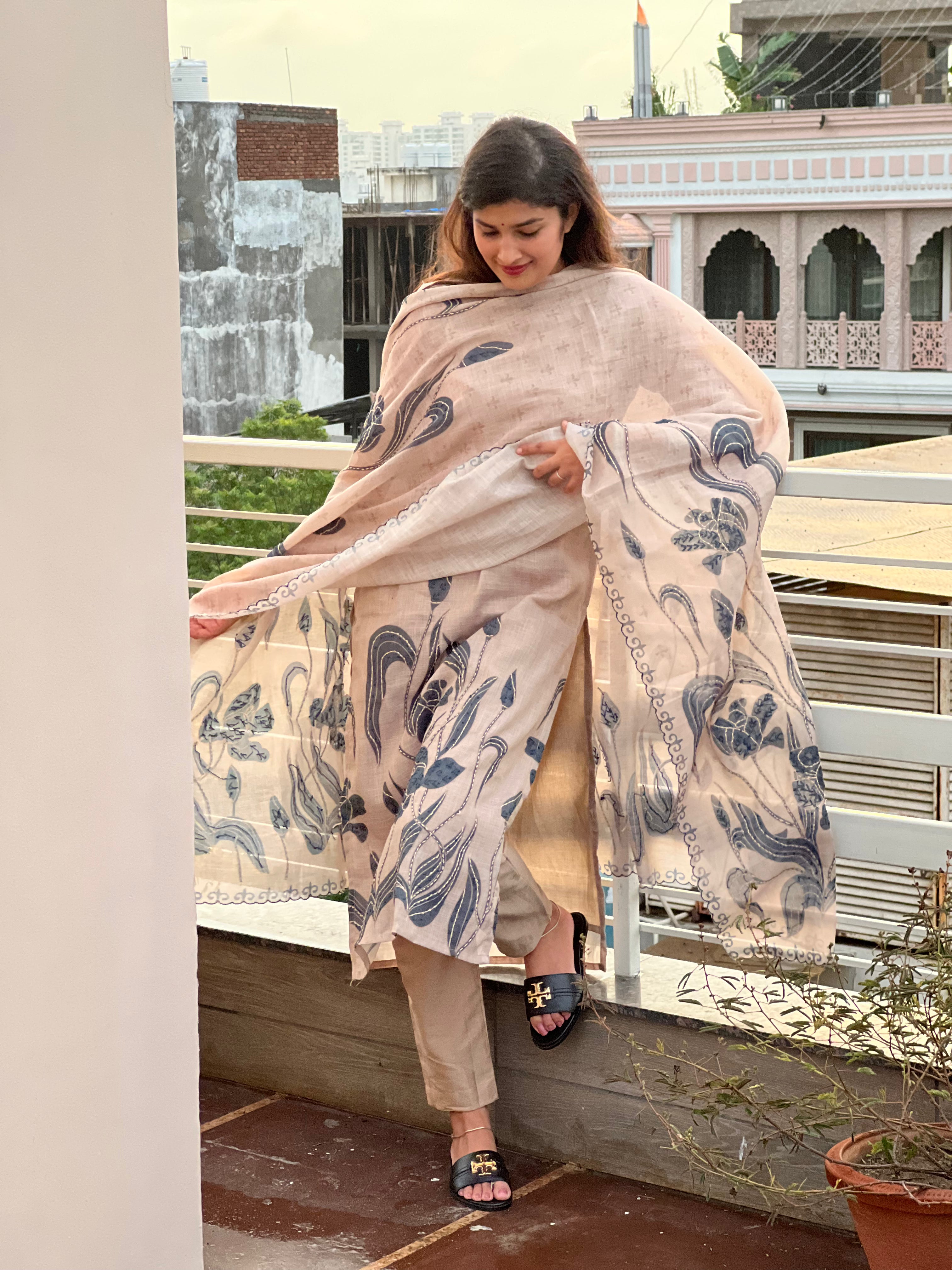 Subtle beige tone with navy